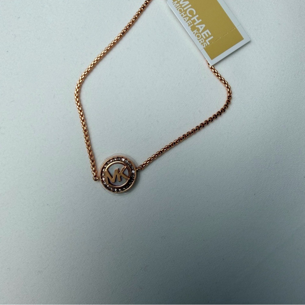 Michael Kors Elegant Gold Bracelet with Logo Charm rose gold color - Picture 8 of 11